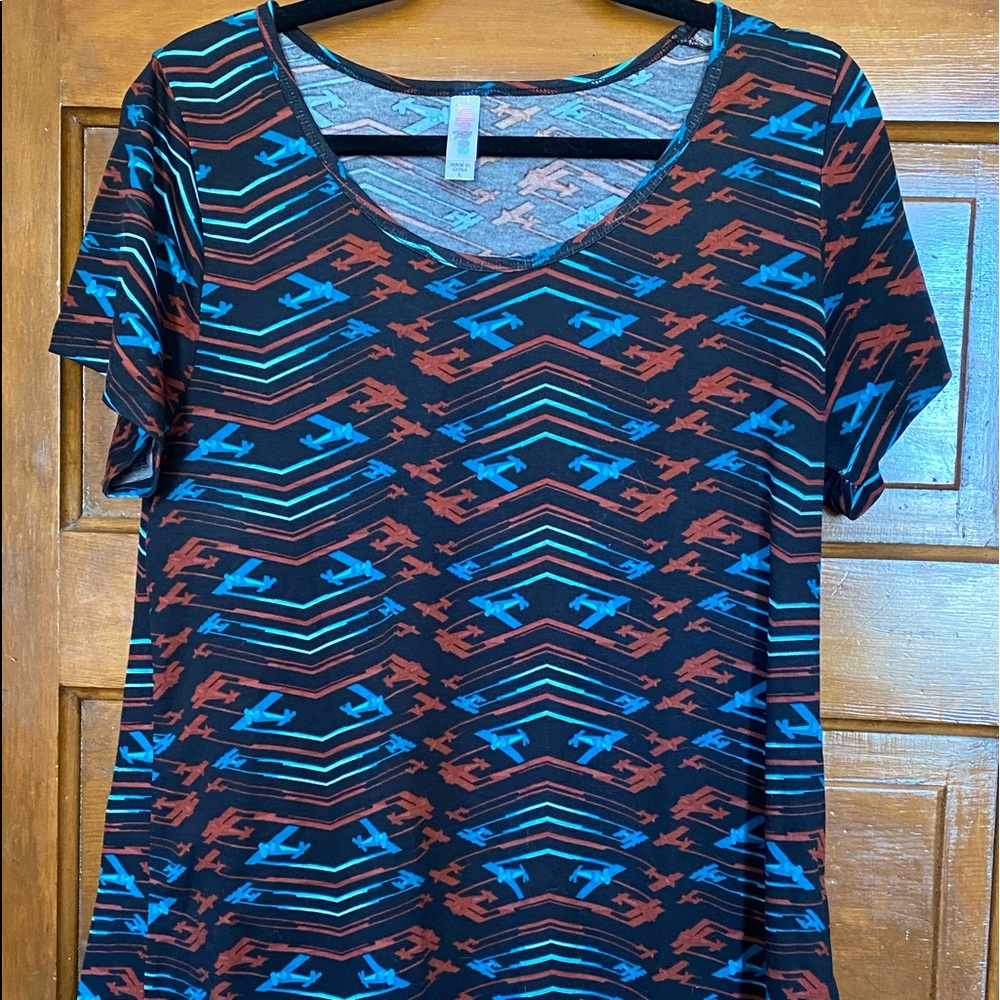 Super cute muted airplane pattern tee